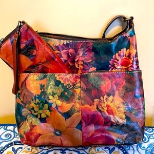 Handcrafted Patricia Nash Italian leather handbag with matching clutch wallet.